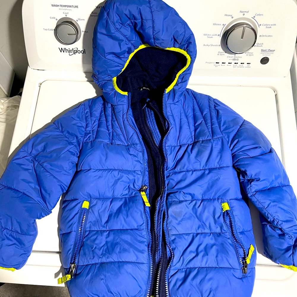 Blue winter jacket, kids size 6. Minor stains shown in picture.